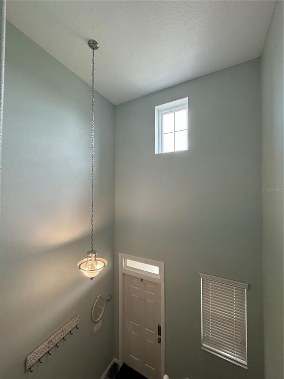 11832 Lake Boulevard New Port Richey, FL 34655 - Photo 10 of 58 a view of empty room with window