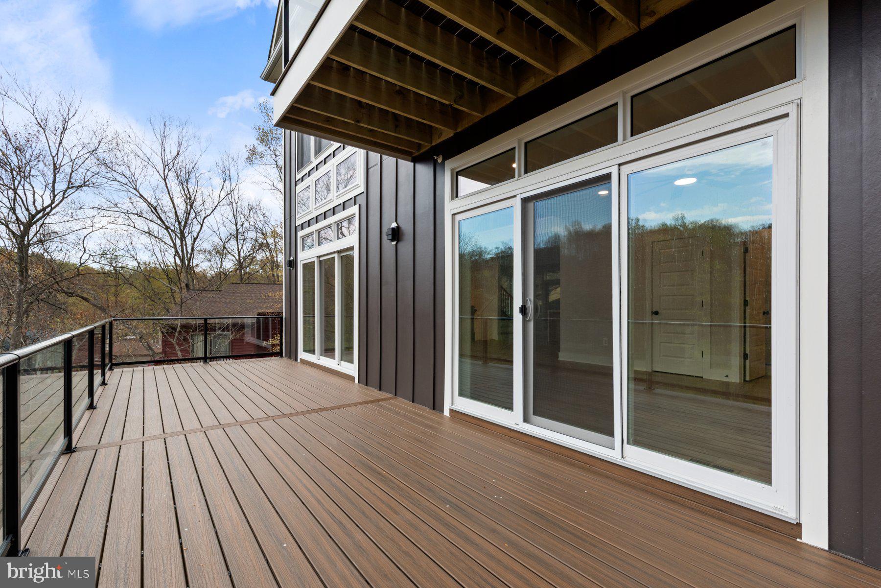 6719 West Lakeridge Road New Market, MD 21774 - Photo 14 of 49 a view of backyard with wooden floor and fence