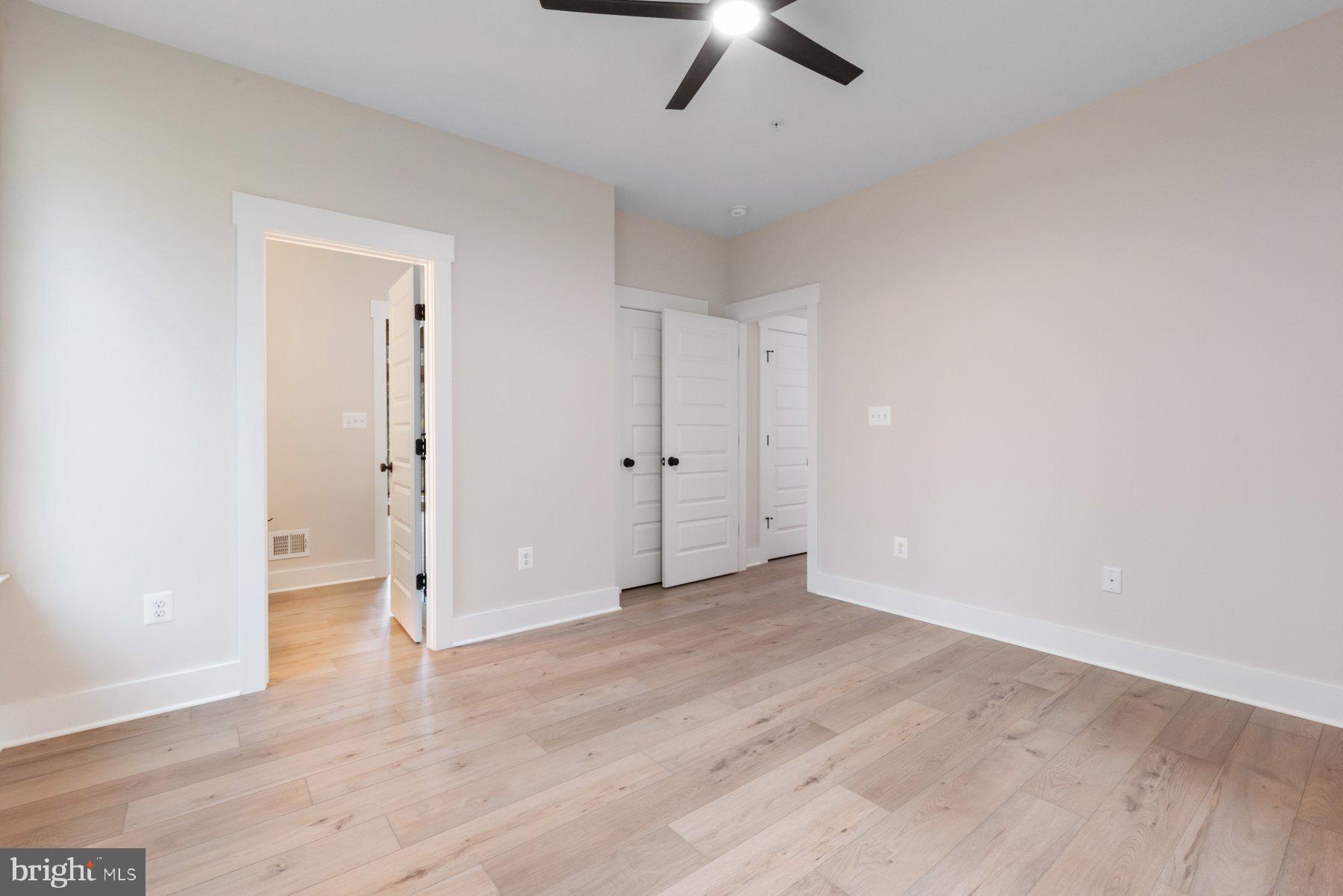 6719 West Lakeridge Road New Market, MD 21774 - Photo 19 of 49 wooden floor in an empty room