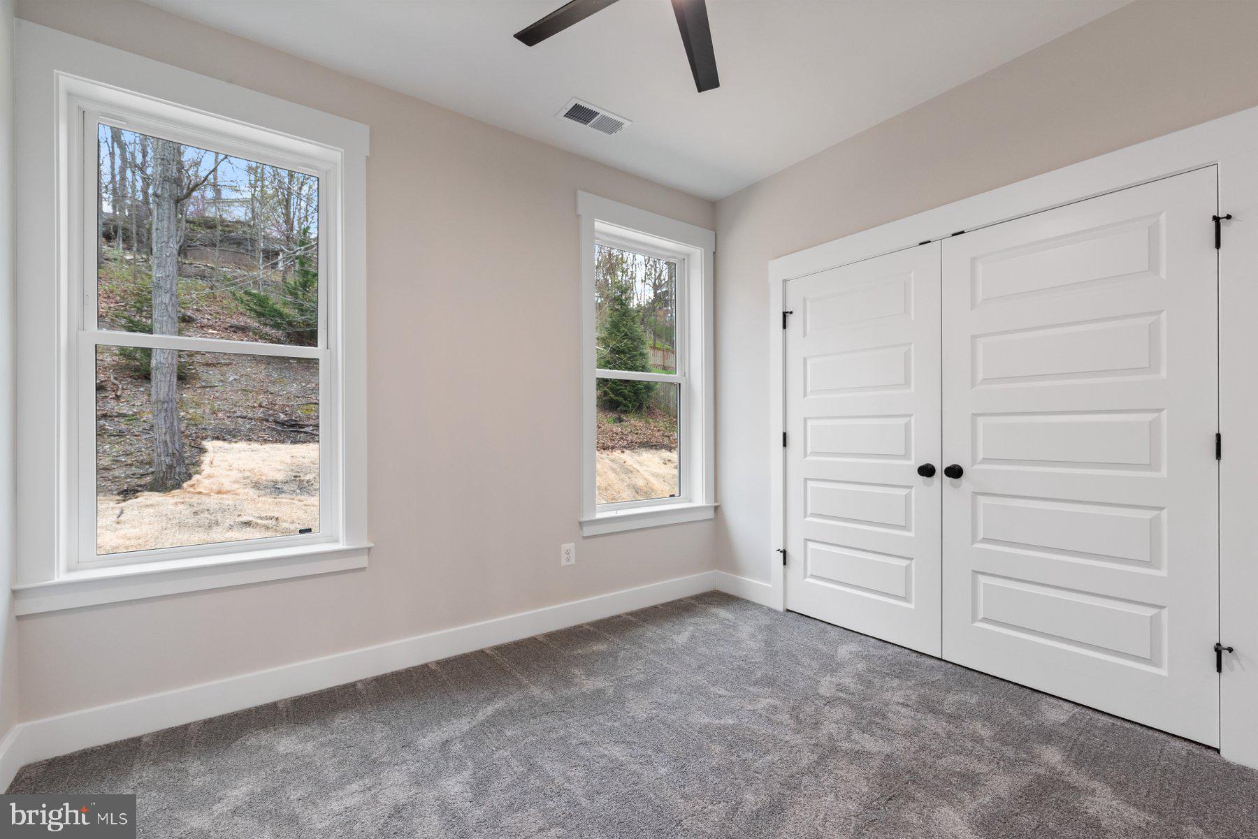 6719 West Lakeridge Road New Market, MD 21774 - Photo 27 of 49 a view of an empty room with a window