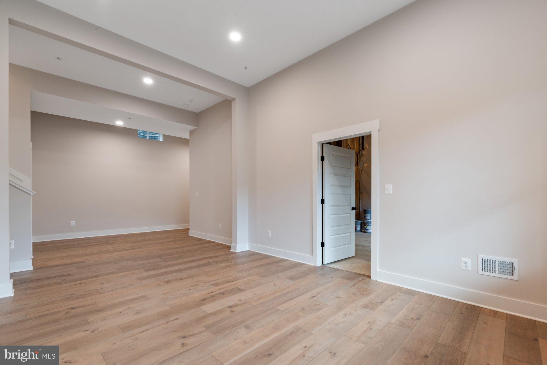 6719 West Lakeridge Road New Market, MD 21774 - Photo 31 of 49 wooden floor in an empty room