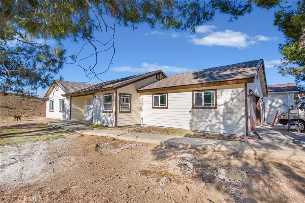 6401 Hubbard Road Acton, CA 93510 - Photo 1 of 20 a view of a house with a patio