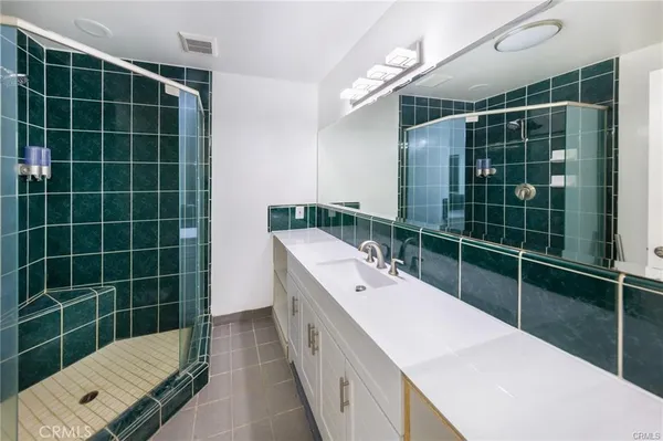 a bathroom with a bathtub and a sink