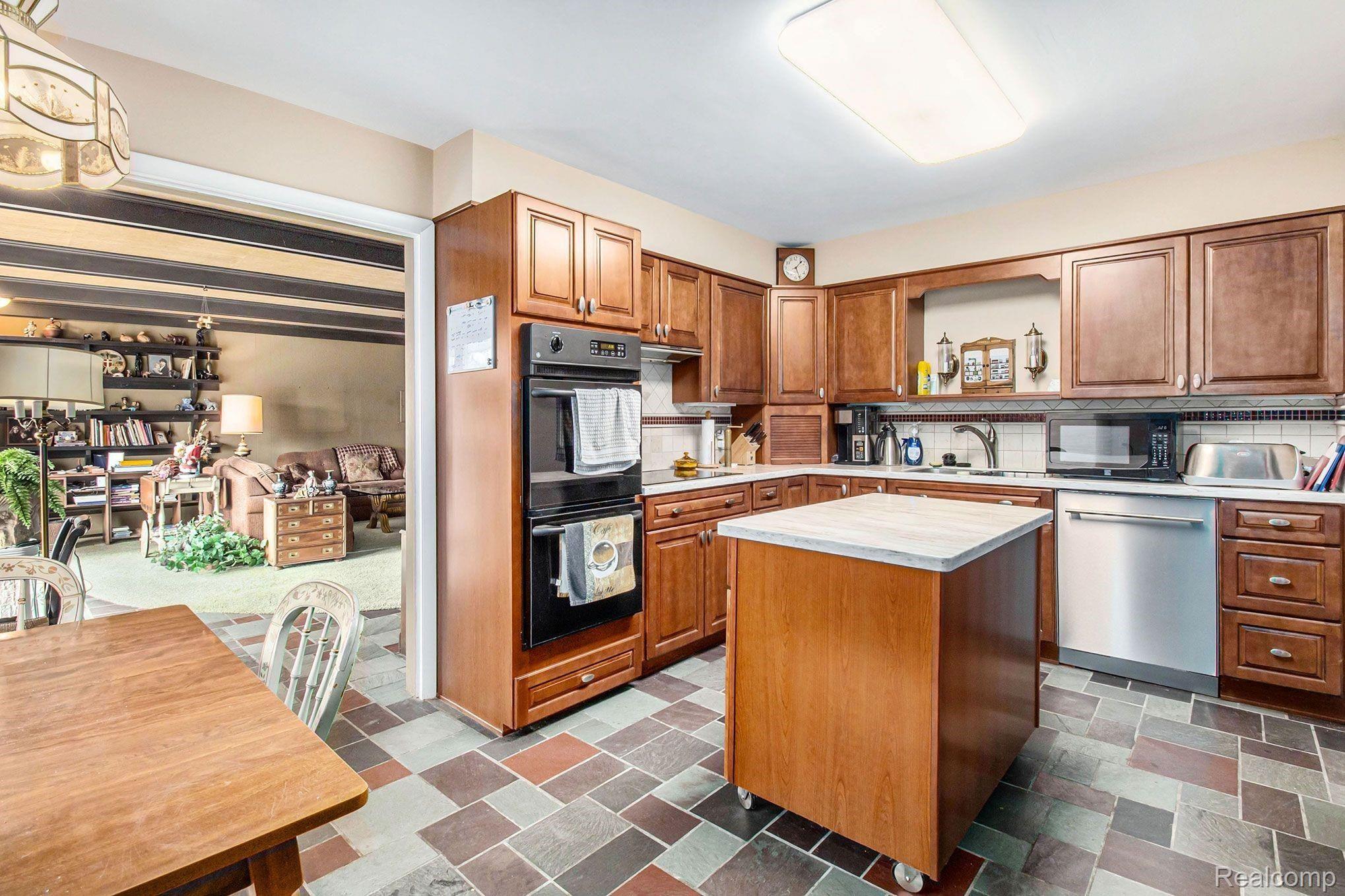 6499 Flushing Road Flushing, MI 48433 - Photo 13 of 36 Kitchen_Great Rm