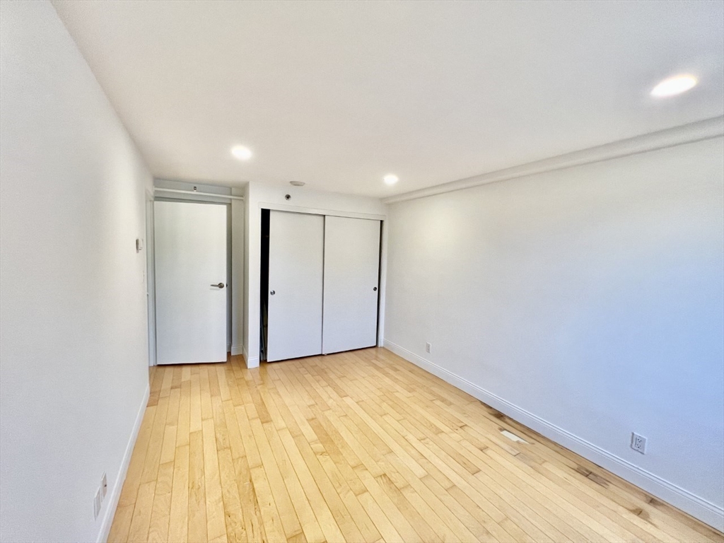 1600 Beacon Street, Unit 1002 Brookline, MA 02446 - Photo 10 of 16 a view of empty room