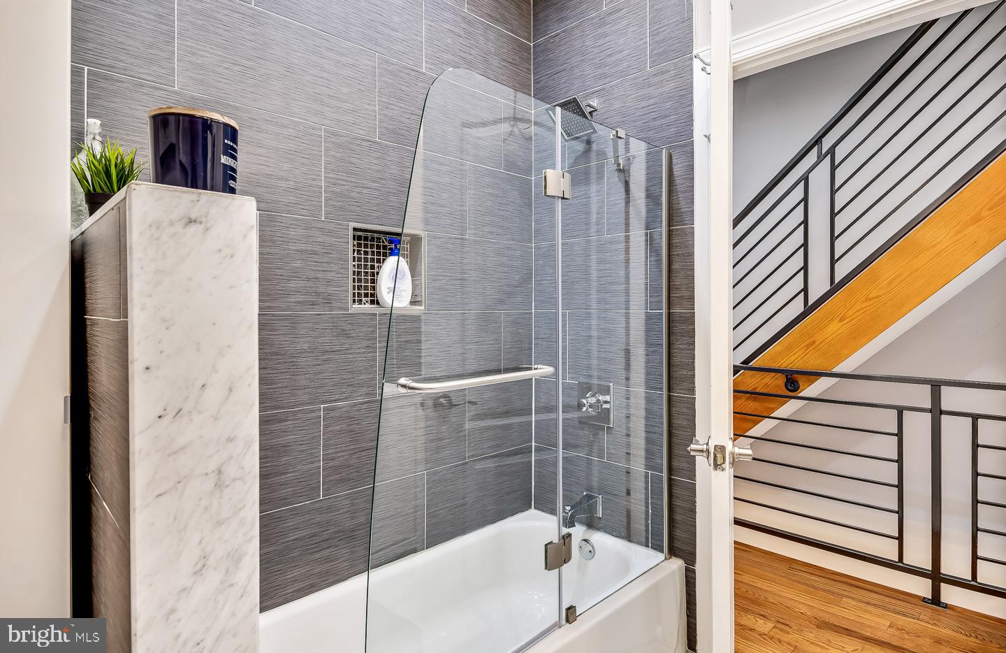 1945 Watkins Street Philadelphia, PA 19145 - Photo 15 of 31 a bathroom with a bathtub and a shower