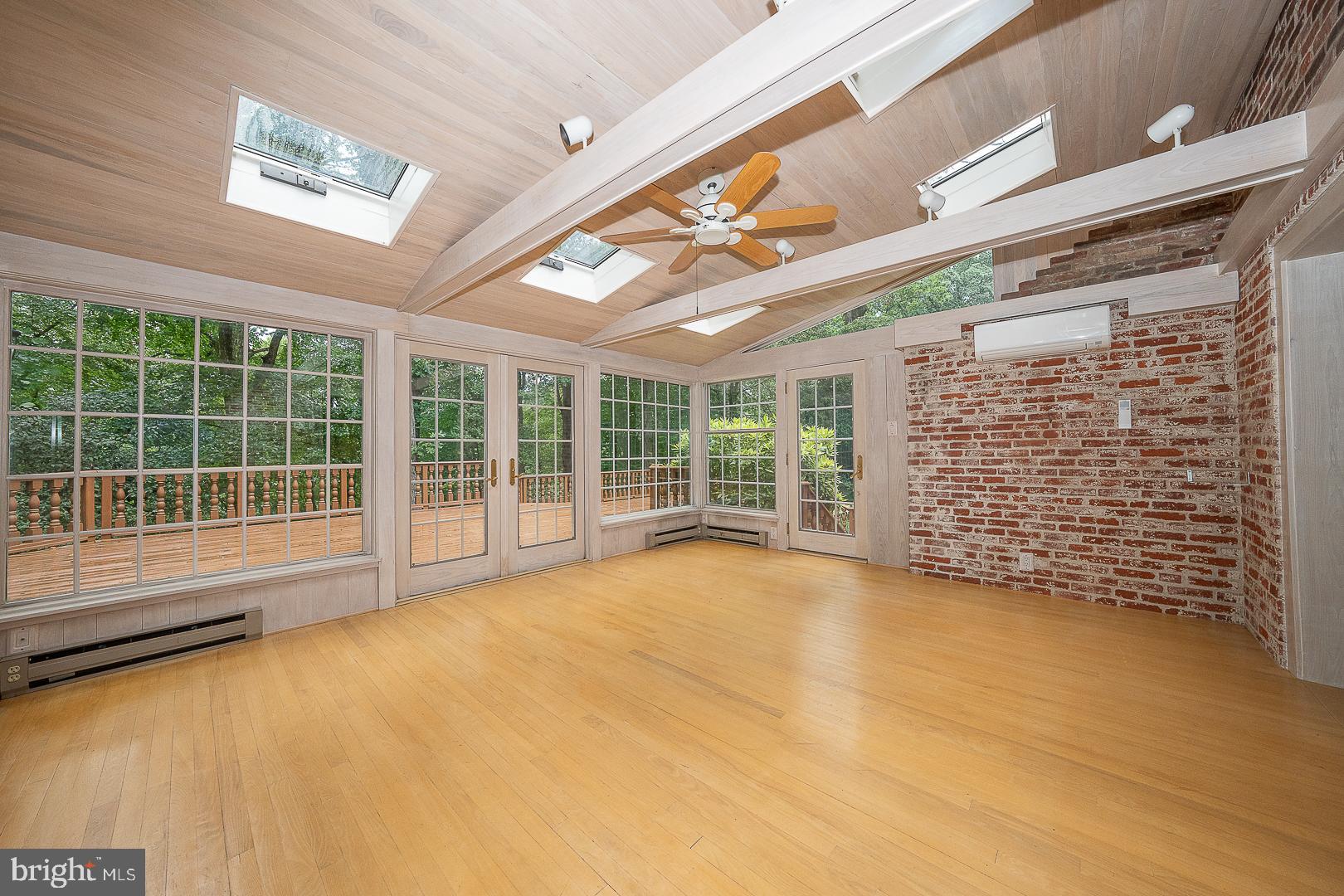 577 Tory Hill Road Devon, PA 19333 - Photo 18 of 63 Sunroom with Skylights and Vaulted Ceiling