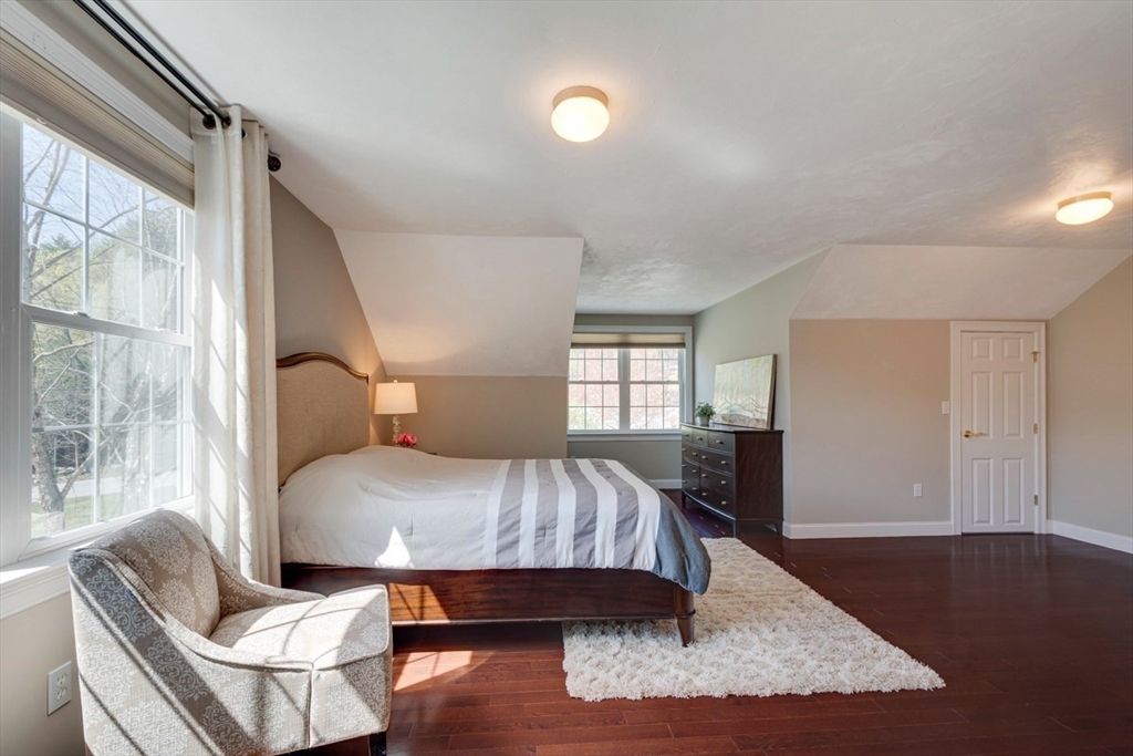 98 Summer Road, Unit 98 Boxborough, MA 01719 - Photo 21 of 27 a bedroom with a bed and window