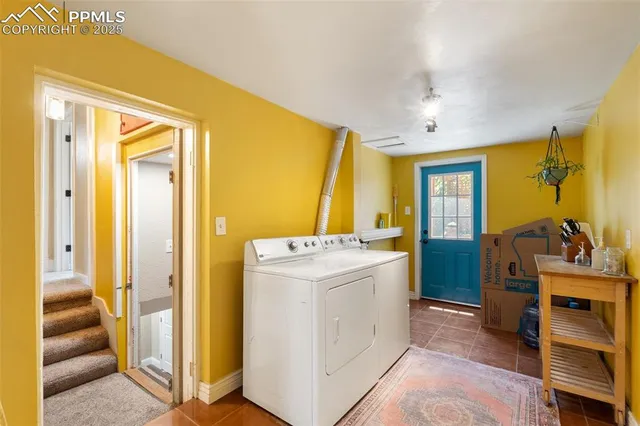 a view of hallway with washer and dryer
