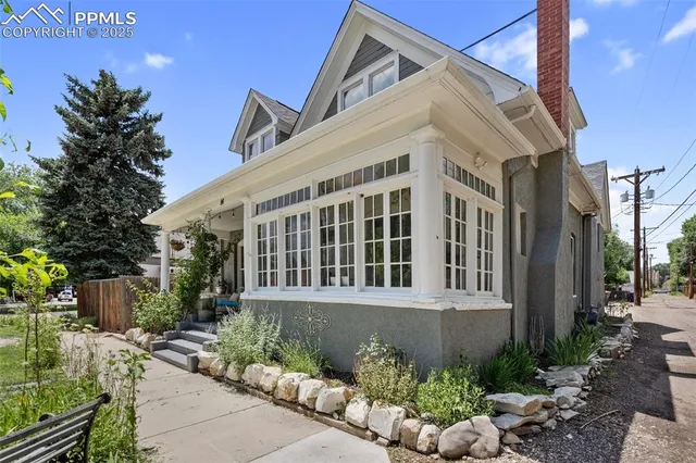 a view of a house with a garden