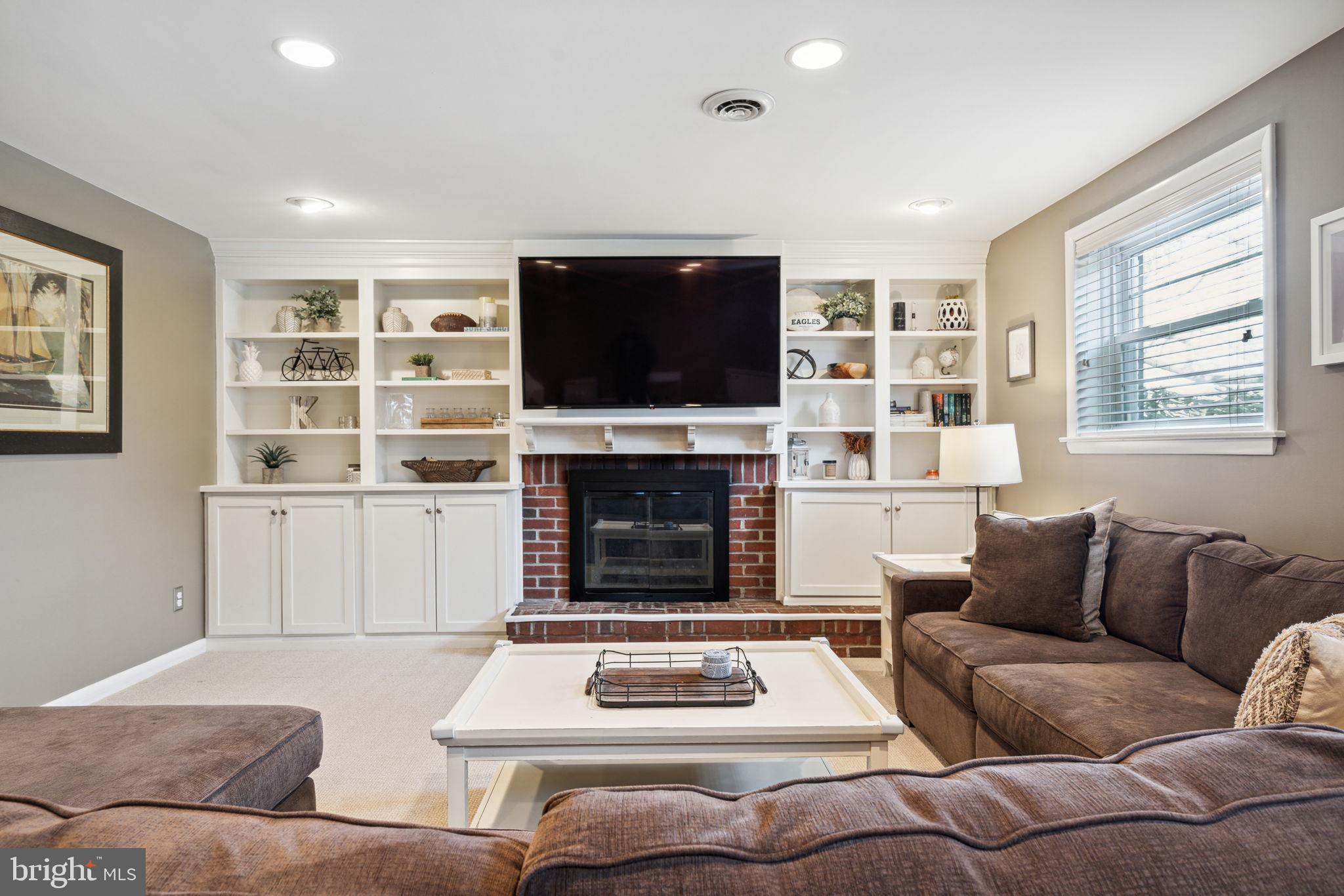 654 Wallace Drive Wayne, PA 19087 - Photo 10 of 35 Built-ins on sides of a wood-burning fireplace
