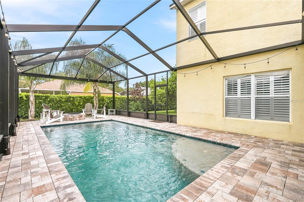 16748 Midsummer Lane Spring Hill, FL 34610 - Photo 45 of 52 a view of a swimming pool with a patio