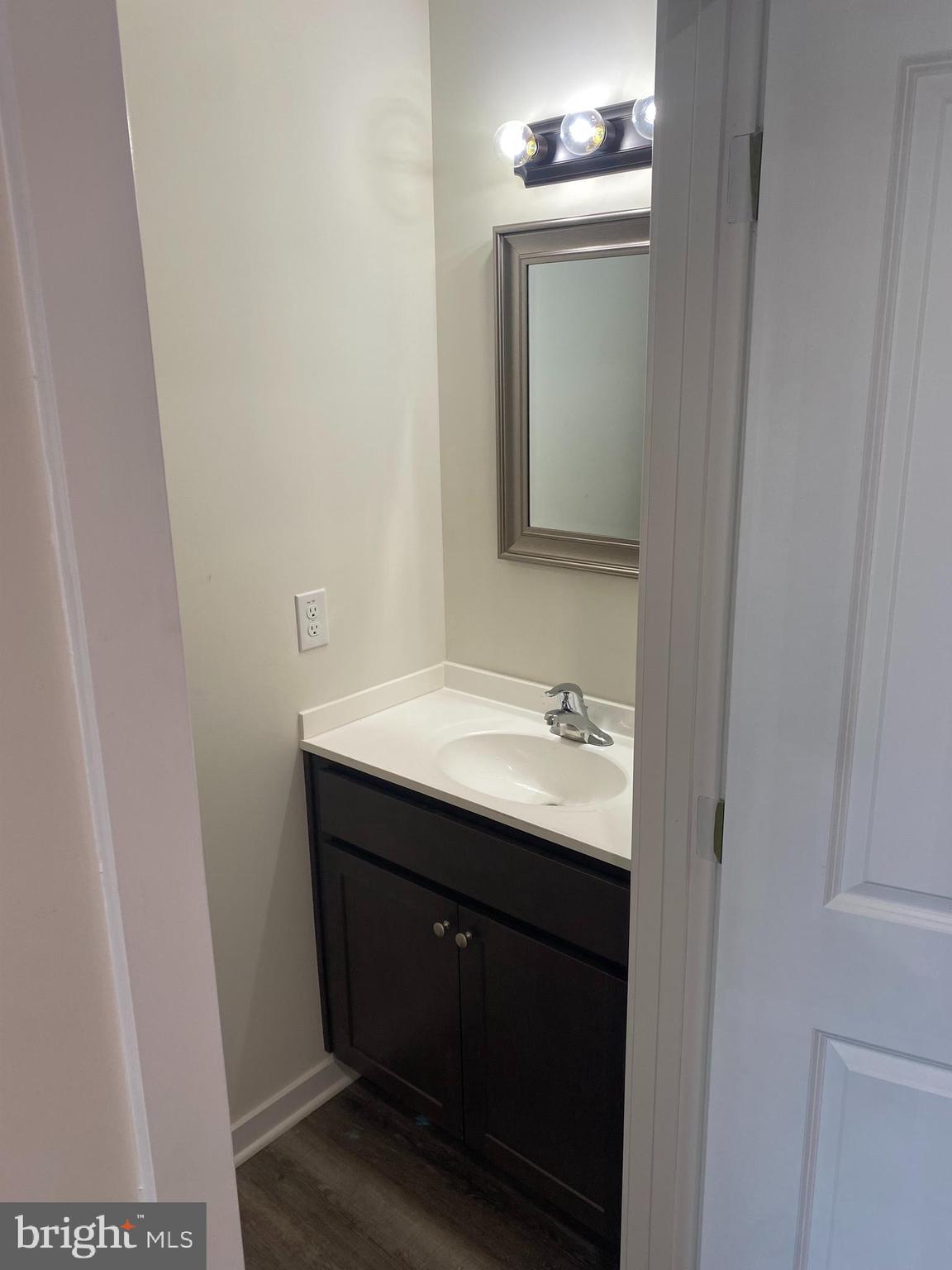 3852 Ridge Pike, Unit 3852 Collegeville, PA 19426 - Photo 14 of 24 a bathroom with a sink and a mirror