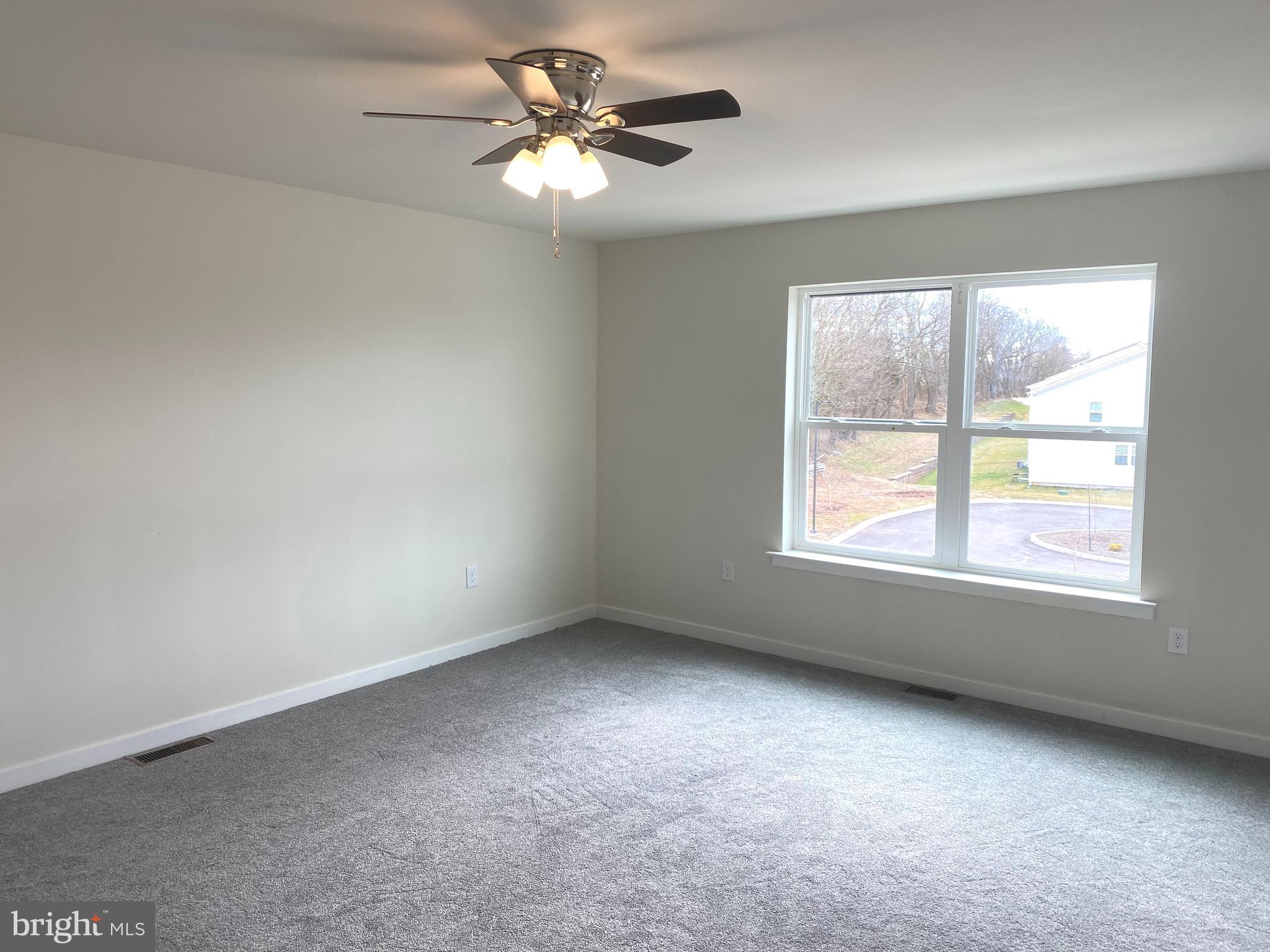 3852 Ridge Pike, Unit 3852 Collegeville, PA 19426 - Photo 17 of 24 an empty room with a window