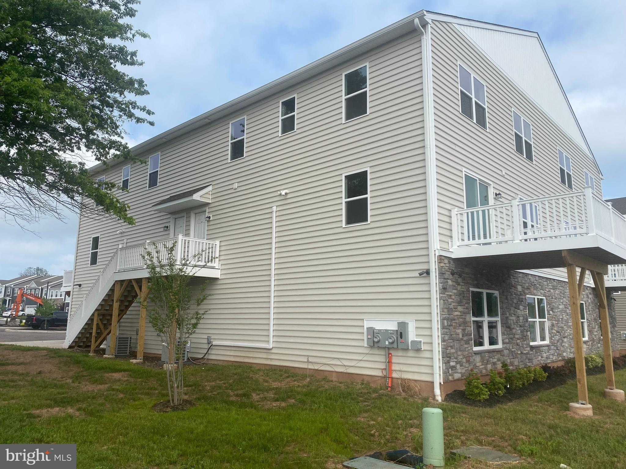 3852 Ridge Pike, Unit 3852 Collegeville, PA 19426 - Photo 2 of 24 a front view of house with yard