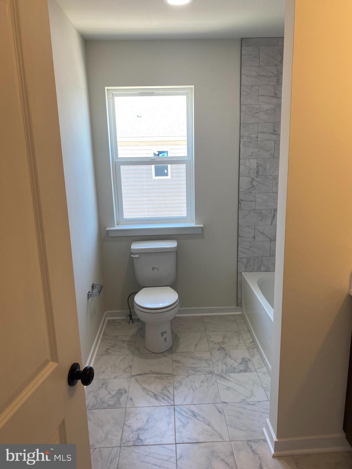 3852 Ridge Pike, Unit 3852 Collegeville, PA 19426 - Photo 24 of 24 a bathroom with a toilet