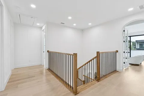 a view of a hallway with closet area