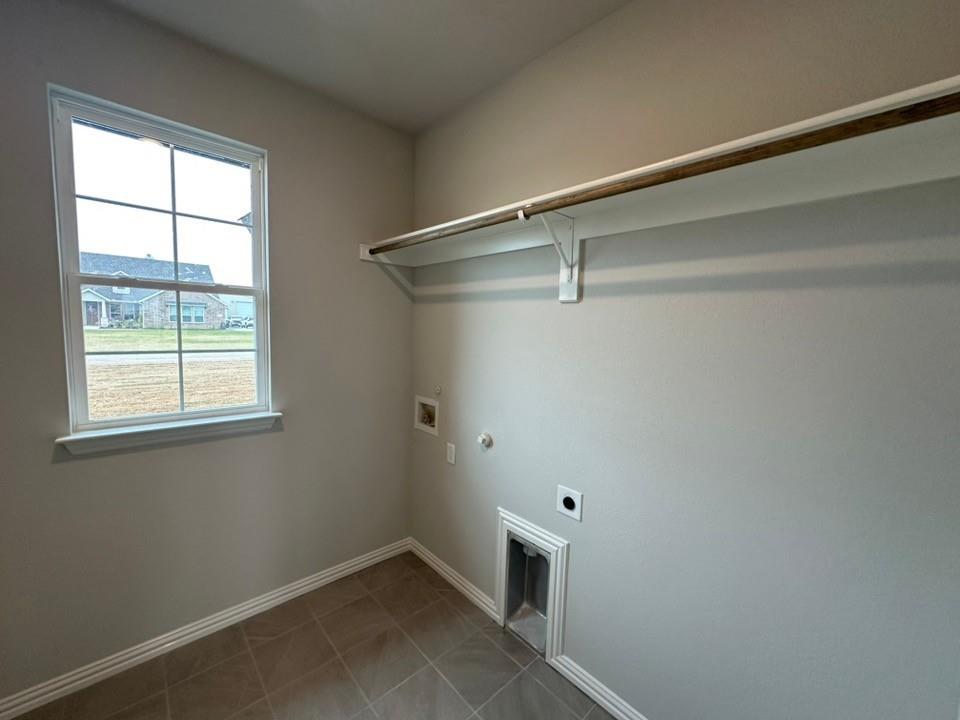 2472 Black Jack Oak Road Terrell, TX 75161 - Photo 12 of 27 a view of storage and utility room with a window