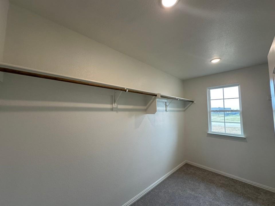2472 Black Jack Oak Road Terrell, TX 75161 - Photo 19 of 27 a view of a room with a empty space and window