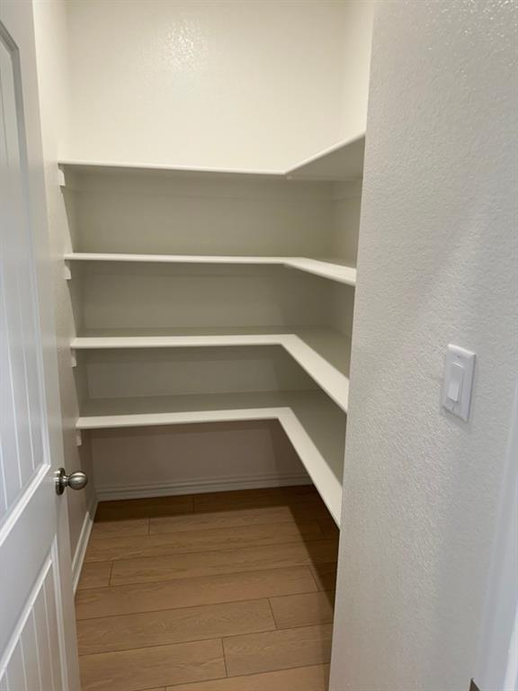 2472 Black Jack Oak Road Terrell, TX 75161 - Photo 9 of 27 a view of walk in closet with empty racks