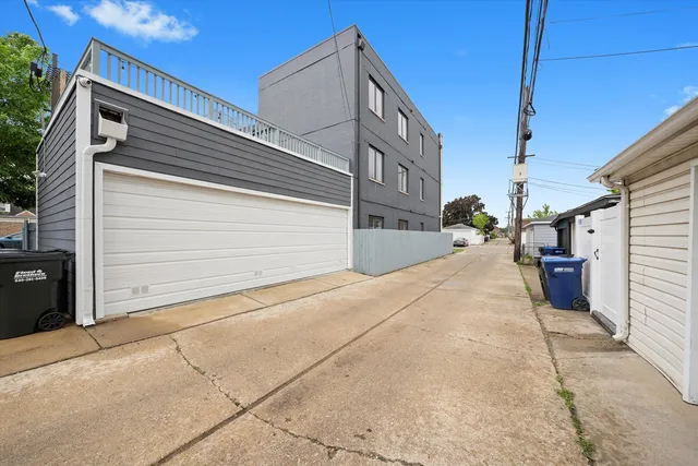 a view of a house with a garage