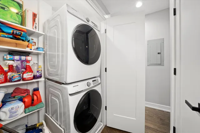 a view of a hallway with washer and dryer