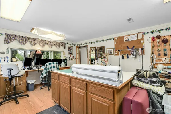 a utility room with multiple dryer and washer