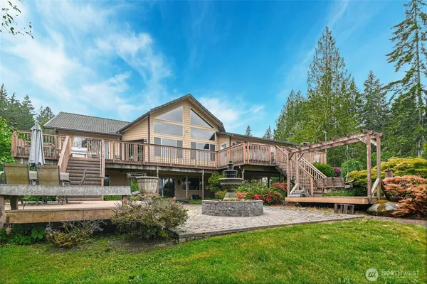 a view of a house with a yard porch and sitting area