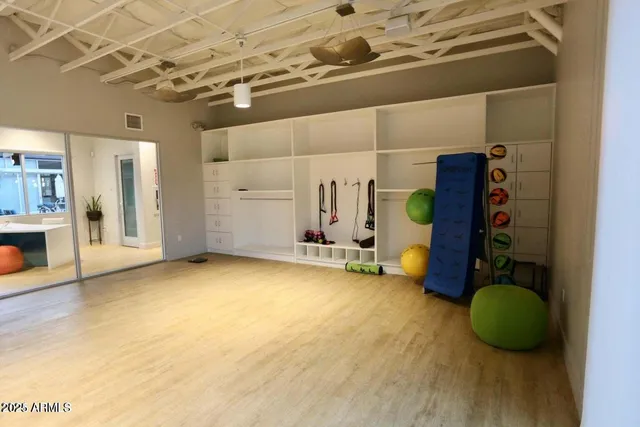 a view of a room with gym equipment