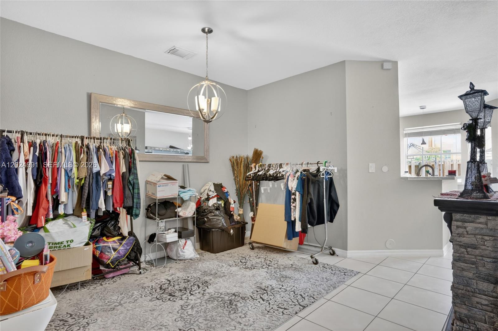 16651 Southwest 79th Terrace Miami, FL 33193 - Photo 6 of 34 a view of a room with gym equipment