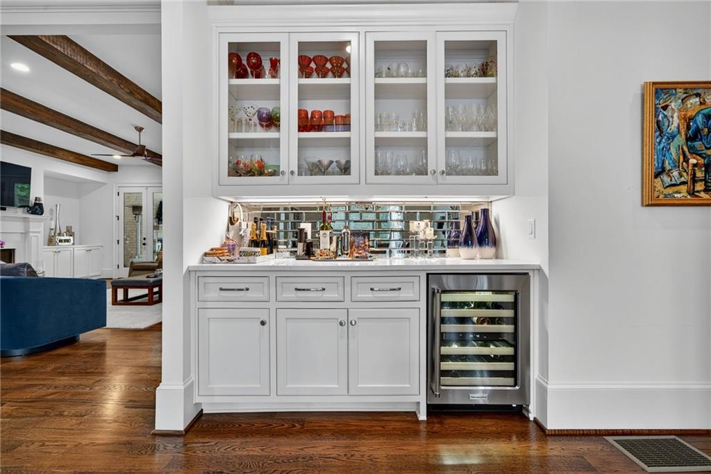 976 Ferncliff Road Northeast Atlanta, GA 30324 - Photo 15 of 58 a kitchen with stainless steel appliances cabinets and wooden floor