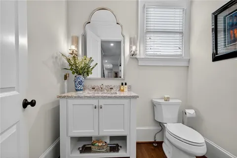 a spacious bedroom with a bed and a table