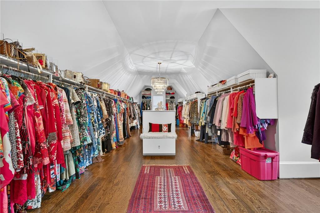 976 Ferncliff Road Northeast Atlanta, GA 30324 - Photo 28 of 58 a view of walk in closet with clothes and shoes