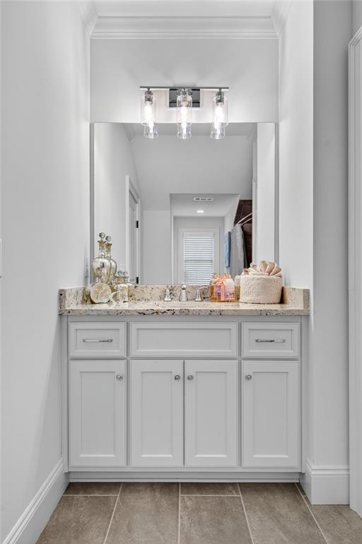 976 Ferncliff Road Northeast Atlanta, GA 30324 - Photo 32 of 58 a bathroom with a sink vanity and mirror
