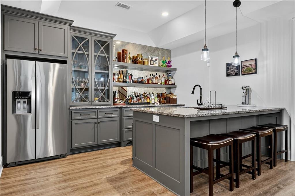 976 Ferncliff Road Northeast Atlanta, GA 30324 - Photo 40 of 58 a kitchen with stainless steel appliances a sink a stove a refrigerator and cabinets