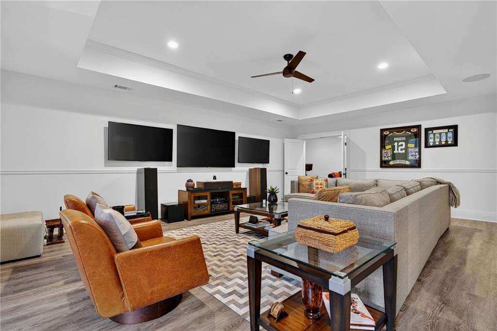 976 Ferncliff Road Northeast Atlanta, GA 30324 - Photo 42 of 58 a living room with furniture and a flat screen tv