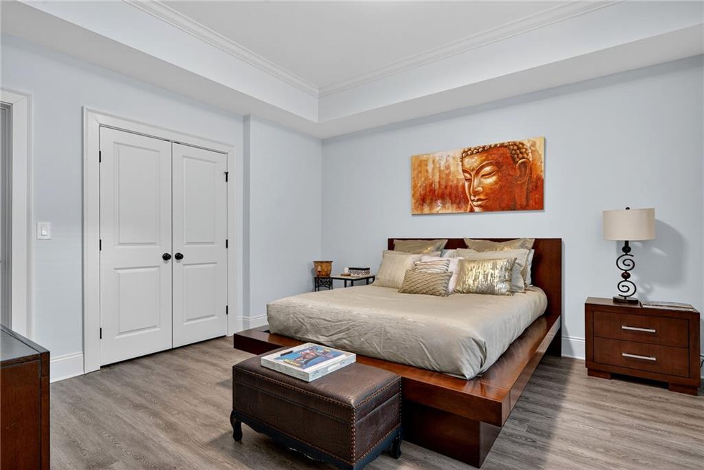 976 Ferncliff Road Northeast Atlanta, GA 30324 - Photo 47 of 58 a bedroom with a bed and a couch