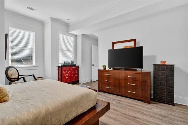 a outdoor space with patio fireplace couches and a dining table with garden view