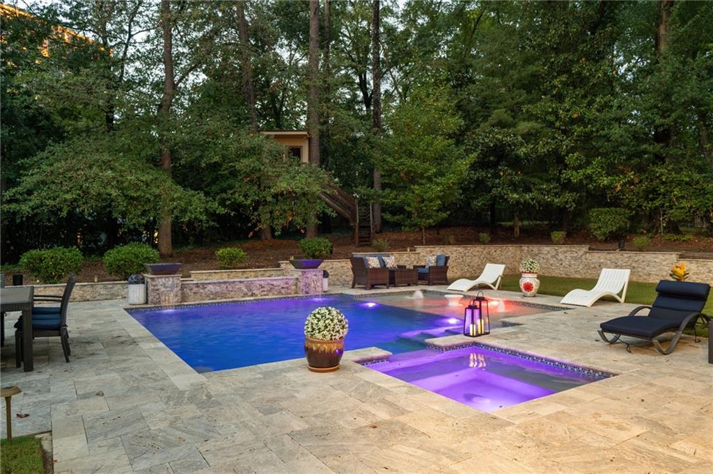 976 Ferncliff Road Northeast Atlanta, GA 30324 - Photo 52 of 58 a view of swimming pool with chairs and plants