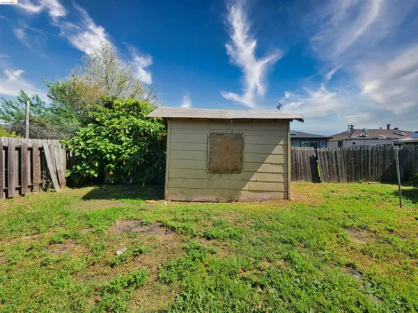 a house with yard in front of it