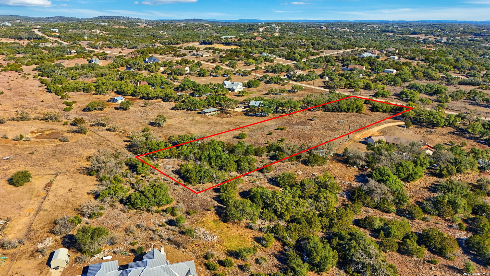 246 Dodder Lane Spring Branch, TX 78070 - Photo 11 of 22 an aerial view of residential houses with outdoor space