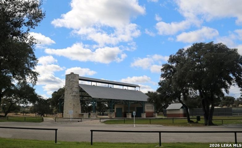 246 Dodder Lane Spring Branch, TX 78070 - Photo 22 of 22 a view of a big building with big trees