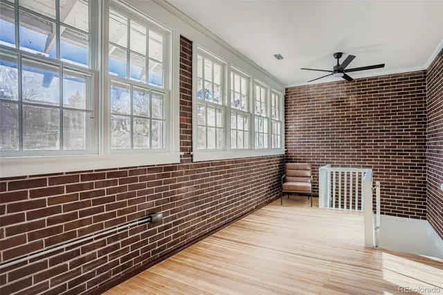 a view of a balcony with wooden floor