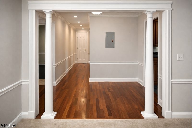 18 Springfield Avenue, Unit 4E Cranford, NJ 07016 - Photo 3 of 11 a view of hallway with wooden floor
