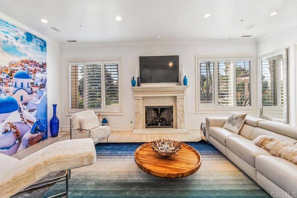 7345 Vista Rancho Court Rancho Santa Fe, CA 92091 - Photo 10 of 71 a living room with furniture and a fireplace