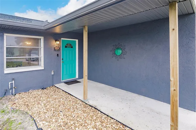 a view of a backyard of a house