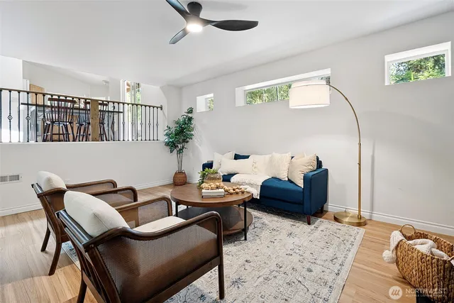 a living room with furniture and a window