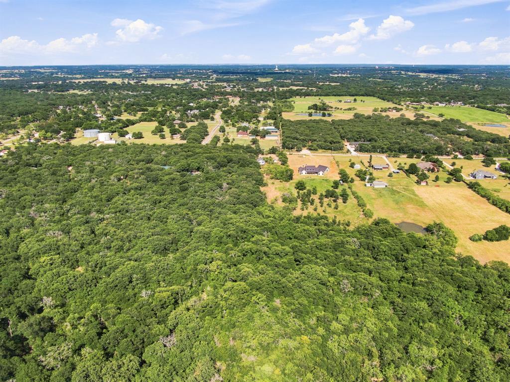 3325 Dove Creek Road Cleburne, TX 76031 - Photo 38 of 40 Expansive wooded acreage featuring mature trees and clearings