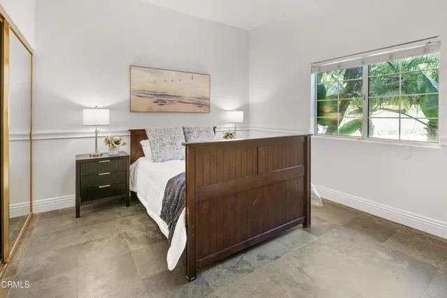 a bathroom with a sink double vanity and a mirror