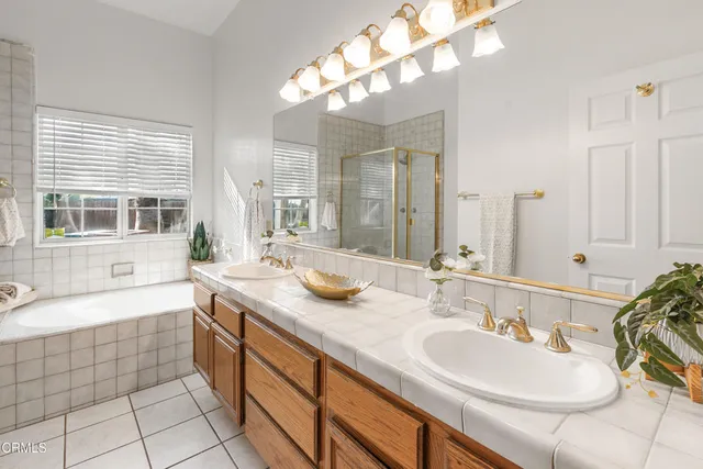 a view of a swimming pool with a sitting area